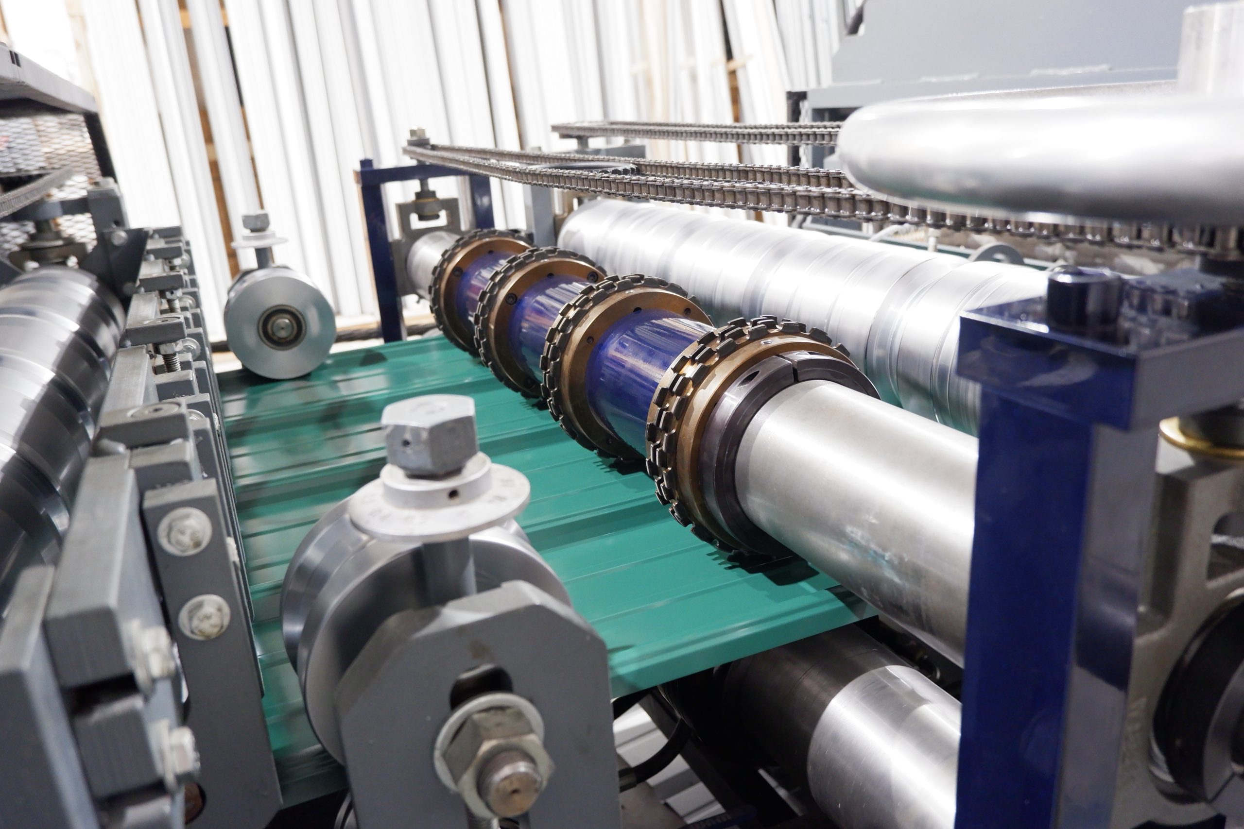 Roller assembly on custom-built soffit hole-punching machine — fabricated for a local metal shop in Liberty, KY