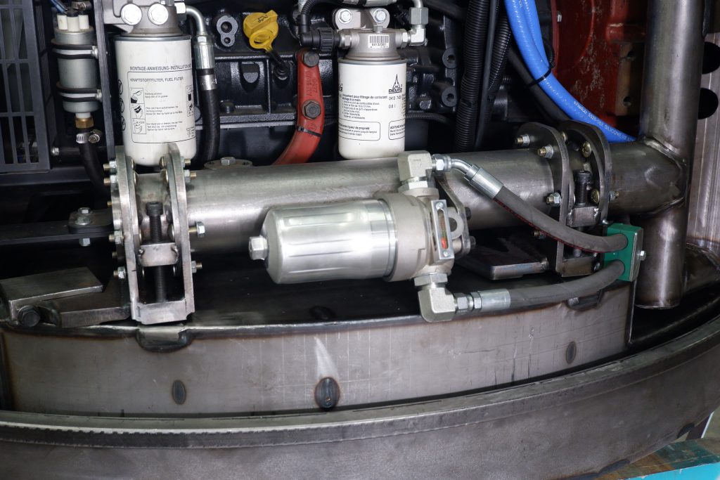 New Hydraulic pump installed in piece of equipment.